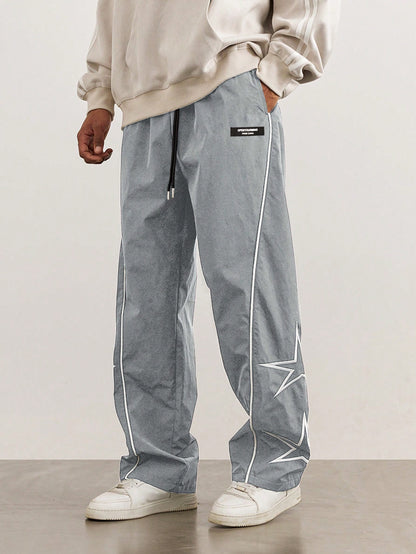 Manfinity Hypemode Men'S Loose Star Pattern Side Striped Pants