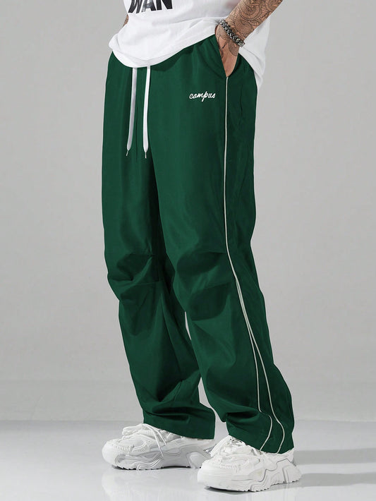 Manfinity Hypemode Men'S Letter Print Drawstring Waist Pockets Straight Loose Casual Pants Baggy Streetwear